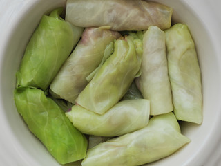 Savoy cabbage rolls stuffed with meat and vegetables, top view.
