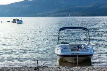 Boat anchored at a beach in lake tahoe