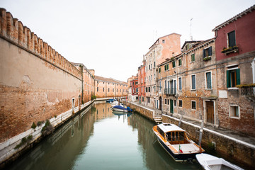 Fototapeta na wymiar Canal Rio della Tana in Venice. Italy. Architecture and landmarks of Venice.
