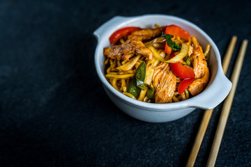 Asian noodles with chicken meat