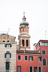 Fototapeta na wymiar Tower of San Bartolomeo Church in Venice.