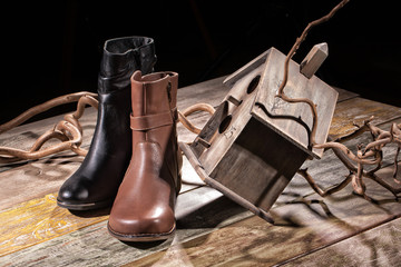 Different Shoes On Wooden Table