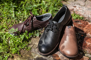 Different Shoes On A Natural Outside Background