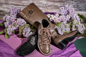 Different Shoes On Wooden Table