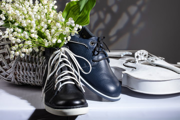 Different Shoes On Wooden Table