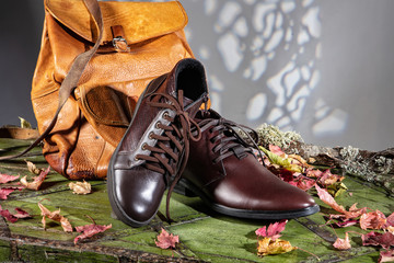 Different Shoes On Wooden Table