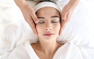 Fototapeta na wymiar Woman Relaxes in the Spa Body massage Treatment.