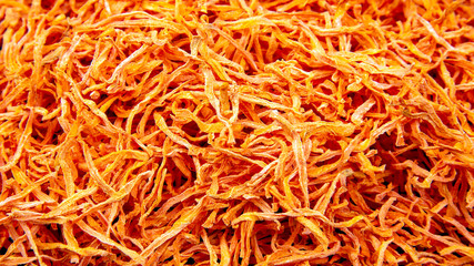 dried carrot slices. vegetables and vitamins. healthy food. food background and texture.