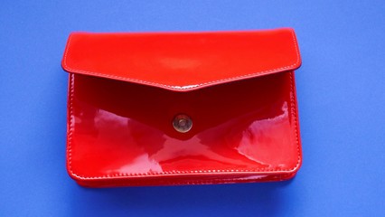 red handbag.  clutch. Women leather handbag.Fashion accessory. red patent leather clutch on a ...