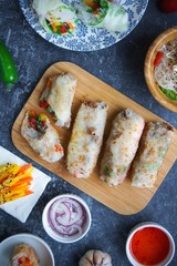 Rice paper rolls with vegetables on a dark background, Vietnamese, Asian food