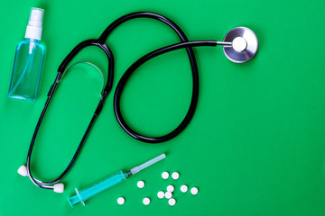 Medical supplies on a colored background as an attribute of the fight against coronavirus