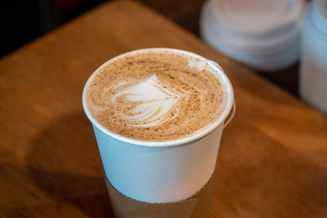 Chai latte in a papercup with latteart