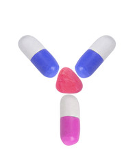 miniature drug model arrange in alphabet isolated on white background