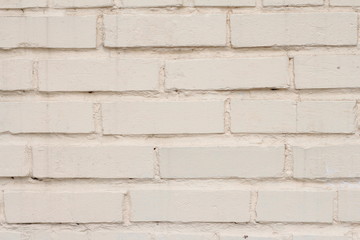 brick wall painted in pastel colors