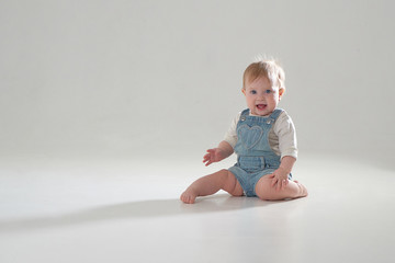 10 month old little baby learning to walk..Studio photography