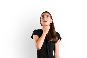 Fototapeta premium Young woman with throat sore stays at home. Influenza symptom. Seasonal flu. Covid-19