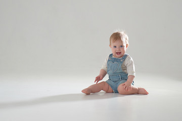 10 month old little baby learning to walk..Studio photography