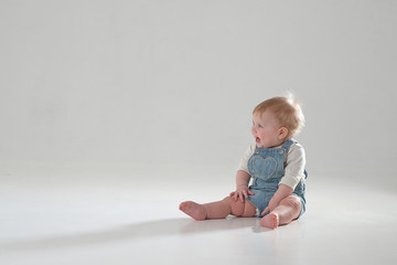 10 month old little baby learning to walk..Studio photography
