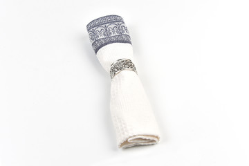 White napkin with grey pattern isolated on white background