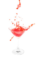 pouring cocktail with splashes isoalted on white background