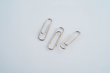 Steel paper clips, accessory of office stationery, Isolated on white background