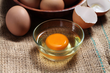 Group of of raw chicken eggs on rustic background, Ingredient for Scrambled eggs in loft style kitchen
