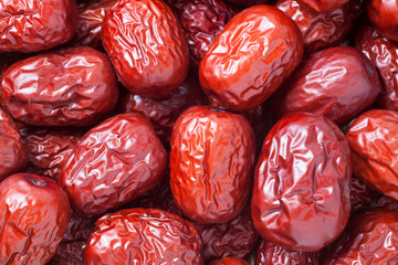 Close-up of dried red dates. Food background