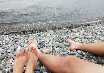 feet on the beach