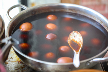 Eggs are boiled in a pan in the kitchen