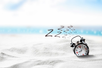alarm clock on the beach