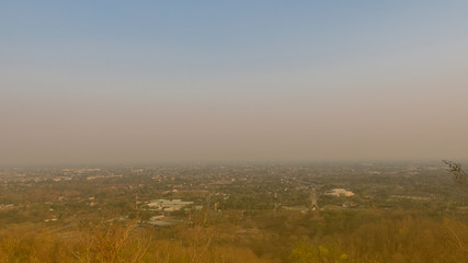 From the top of Doi Kham seen in the city of Jung, Chiang Mai temple, Thailand that is full of smog.