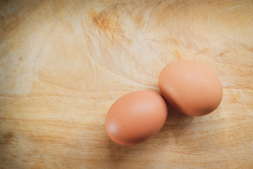 hen egg put on wood cutting board in kitchen prepare cooking