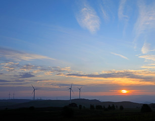 The windmill in the sunset, on the hillside
