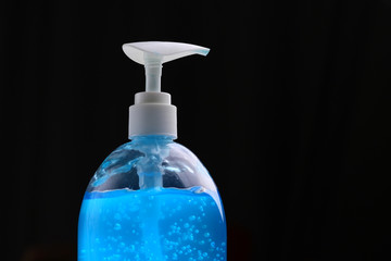 clean alcohol gel medical on black background