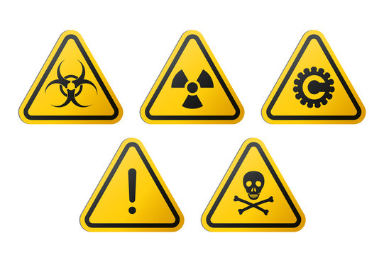 Triangular signs of a hazard warnings : biohazard, ionizing radiation, coronavirus, poison and generic danger