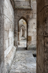 Fototapeta na wymiar Walk through the facade of the gothic Cathedral of Regensburg in Bavaria, Germany