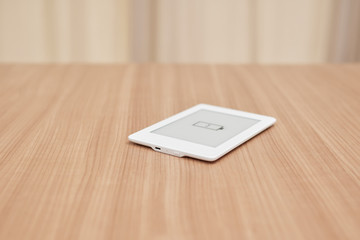 e-reader, kindle, with low battery symbol