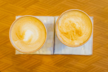 cup of cappuccino on a table