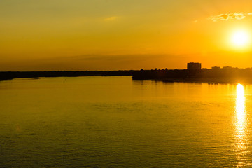 View on a Dnieper river and city Kremenchug at sunset