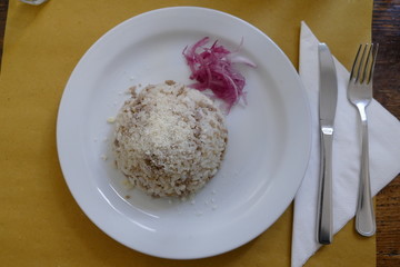 Pilota Rice with sausages and onions