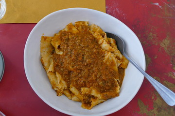 Tordellate noodles dressed with Ragù