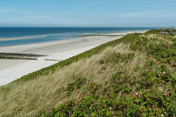 A panoramic view over the wide beach of Wangerooge, Germany on a sunny day