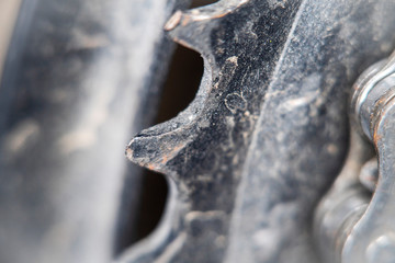 Gear wheel, part of a bicycle gearshift system. Close-up.