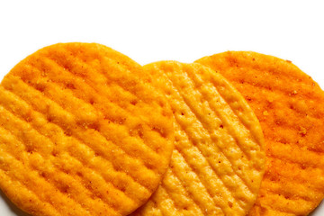 crispy spicy crackers on white background
