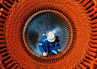 An engineer perform general inspection for Stator Generator of Gas Turbine Power Plant