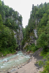 Fototapeta na wymiar Hiking through the Partnach Gorge near Garmisch-Partenkirchen, Upper Bavaria, Germany