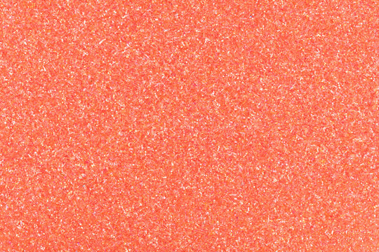 Coral glitter background, stylish texture for your creative design work. High quality texture.