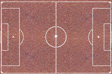 Terrain de football, marquage sur texture scoriacée