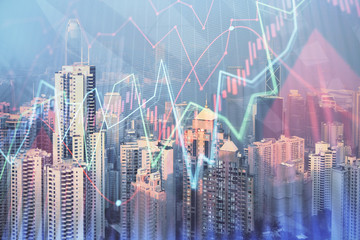 Forex chart on cityscape with skyscrapers wallpaper double exposure. Financial research concept.