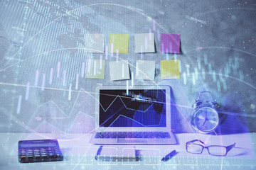 Double exposure of forex graph and work space with computer. Concept of international online trading.